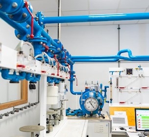 Low pressure flow calibration facility